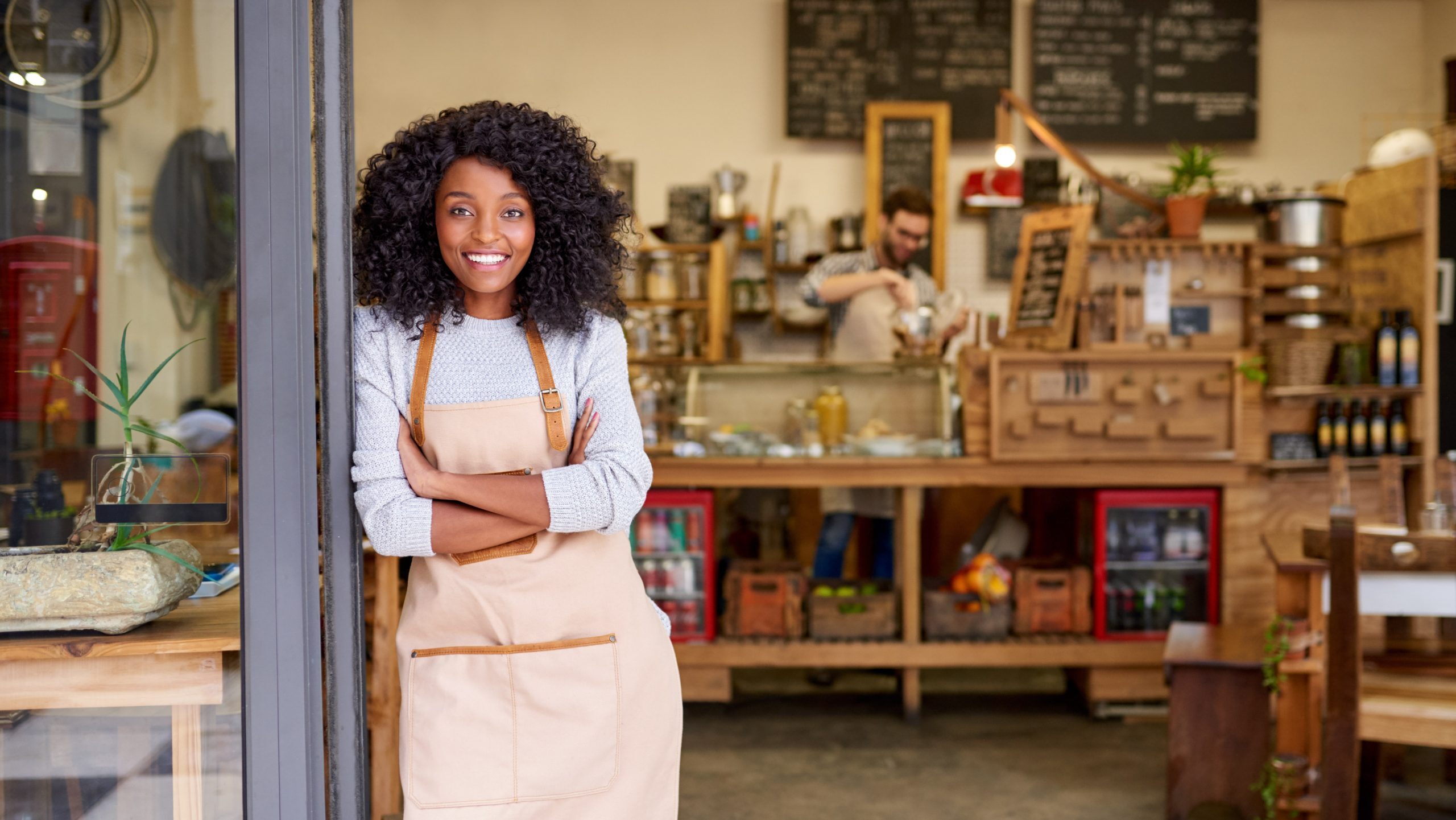 Small business owner understanding interchange-plus pricing for lower fees